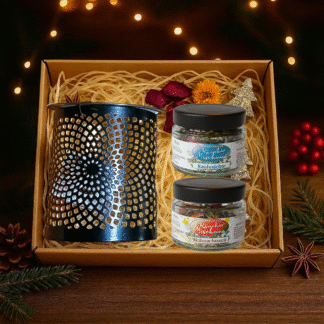 R&auml;ucherwerk und St&ouml;vchen in einer weihnachtlichen Box.